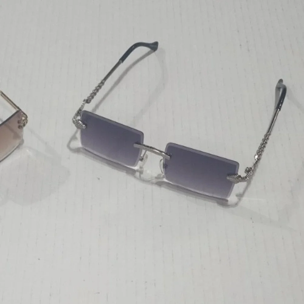 Womens silver snake embellished rimless fashionable sunglasses uv protection